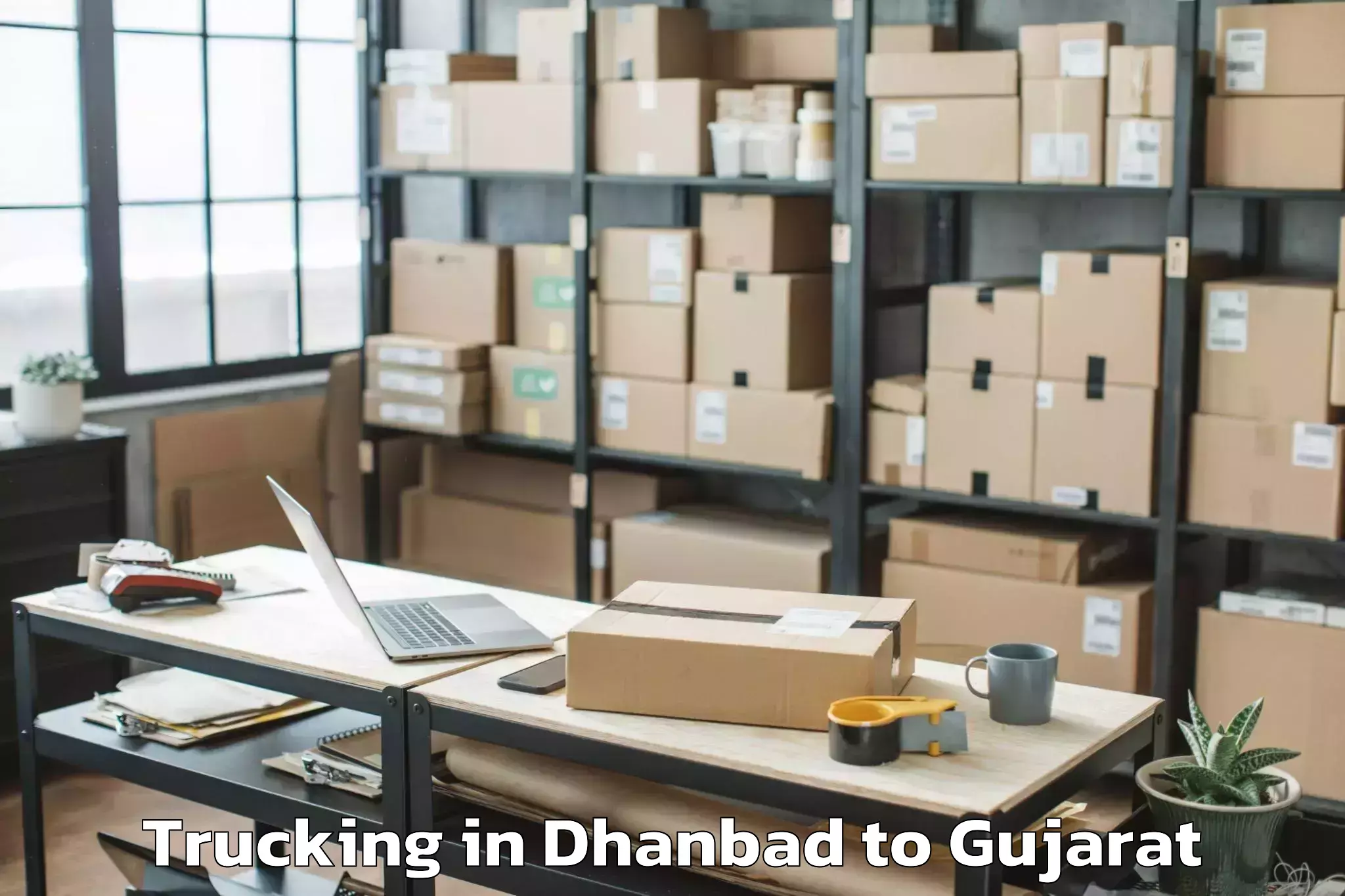 Quality Dhanbad to Sojitra Trucking